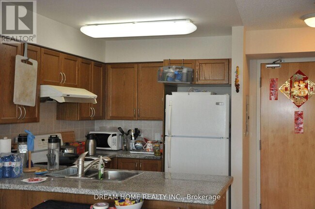 Photo - 7363 Kennedy Rd Unité 303