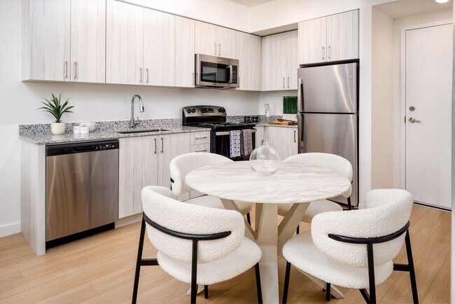 Área de cocina y comedor - Sunrise at Liberty Square