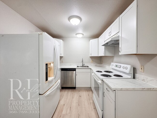 Photo - Refreshed 3-Bed Hefner Home with Private Lawn & Covered Parking