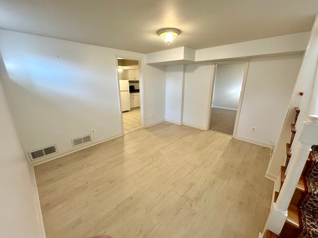 Living Room or Bedroom, with New Light-Wood Design Tile - 201 E Indian Spring Dr Unit 1 - Yard - Utilities