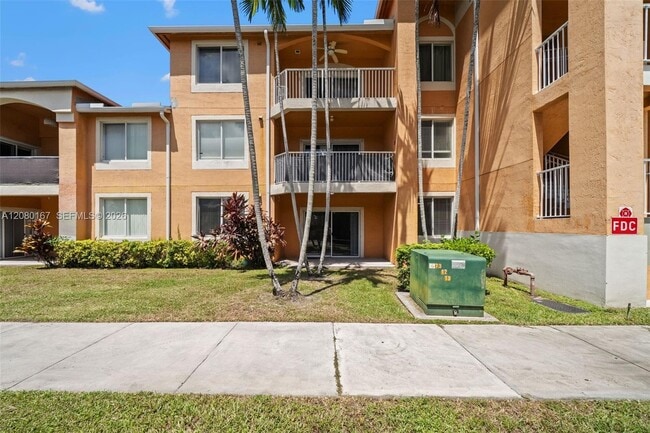 Building Photo - 6992 SW 39th St Unit I104