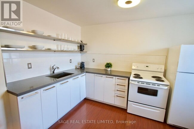 Photo - 1130 Queen St W Unité 3