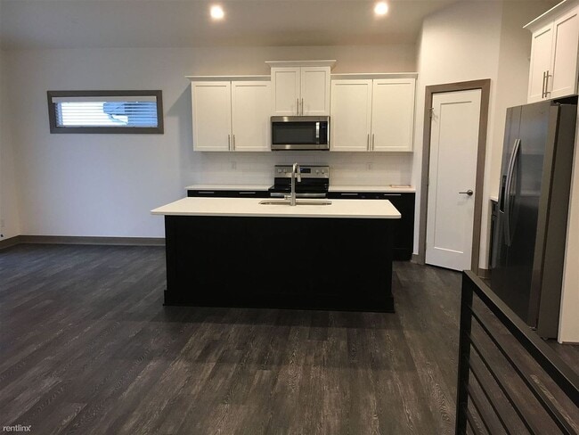 Photo - Spacious 4 bedroom/3 bath home with finished lower level and attached 2 car garage