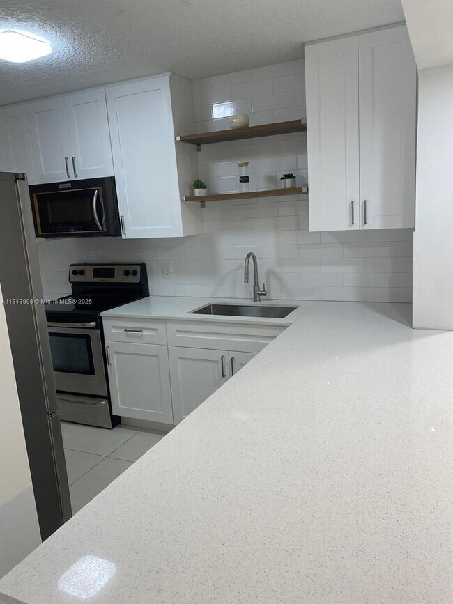 Photo - 8411 Forest Hills Dr Unit 105