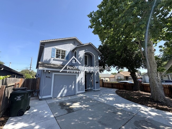 Photo - Great 4 Bd/2.5Ba Duplex with 1 Car Garage!