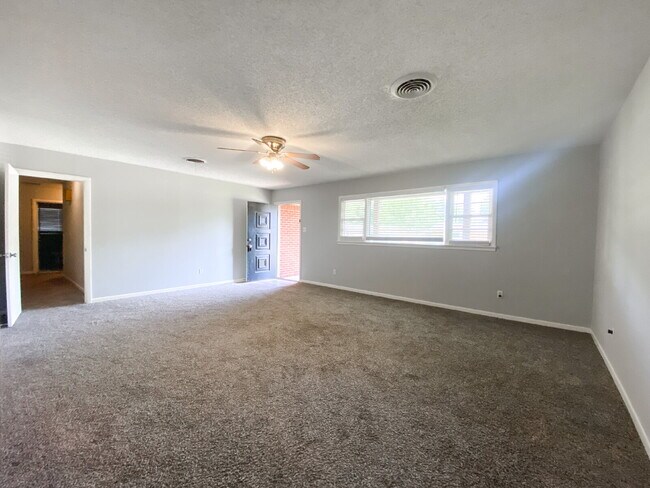 Photo - Charming 3-Bedroom Home with Cozy Fireplace