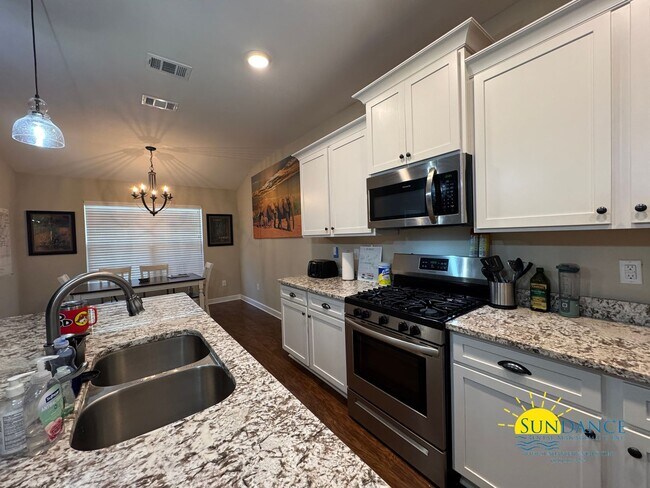 Photo - Stunning 4 Bedroom Home with Sparkling Pool!