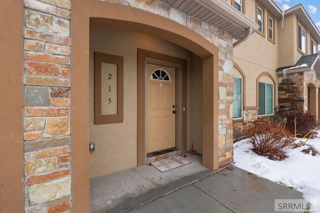 Photo - Beautiful 3-Bed, 2.5-Bath Rock Creek Townhome with Attached 2-Car Garage