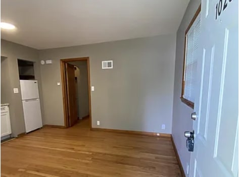 Living Room and Kitchen View from Front Door. - 1028 S 24th St Unit 1028 S 24th Street
