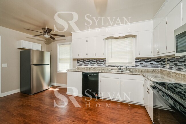 Photo - The living is easy in this 4 bedroom, 1.5 bathroom home