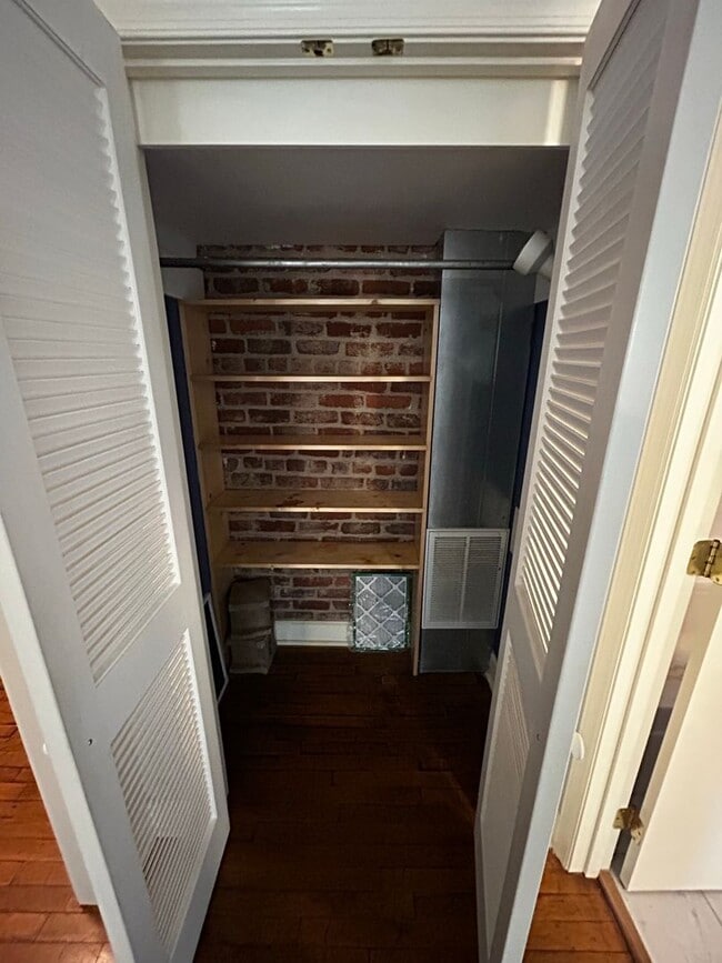 Photo - Riverviews 1 Bedroom with Exposed Brick, Hardwood Floors