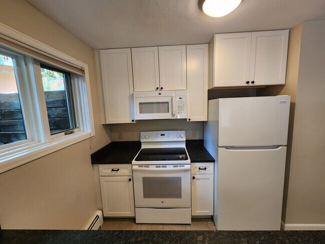 Photo - Updated 1BR Condo at the Edge of Boulder – Private Patio & Parking! Unit 9