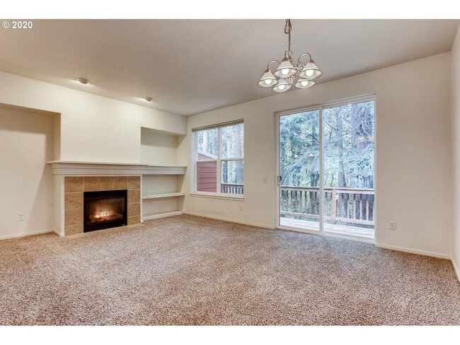 Photo - Forest-View Three-Level Townhome with Ensuite Bedrooms, Attached Garage & Fenced Yard