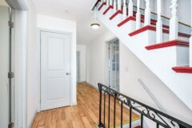 Photo - Renovated 4BR with In-Unit Laundry Near Moody Street