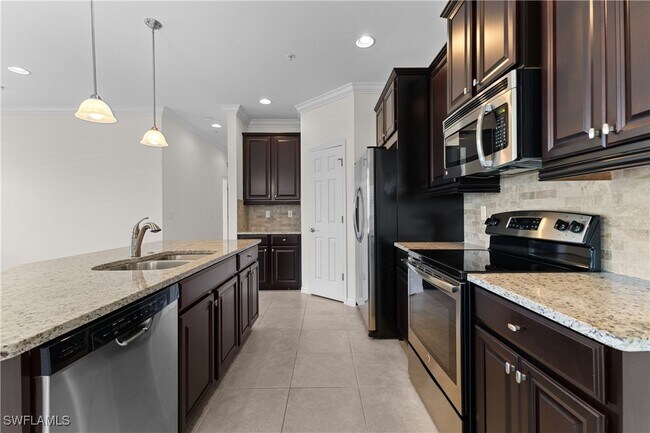 Building Photo - 8531 Violeta St Unit 203