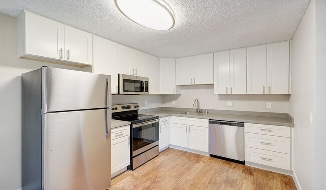 Updated kitchens with premium finishes are available for upgrade.