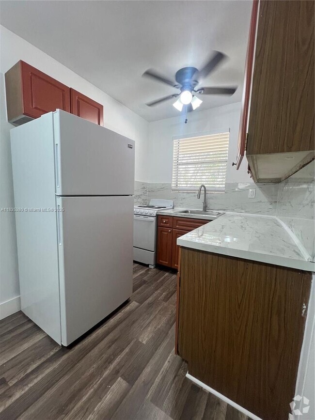 Building Photo - 7130 W 11th Ct Unit 14 Rental
