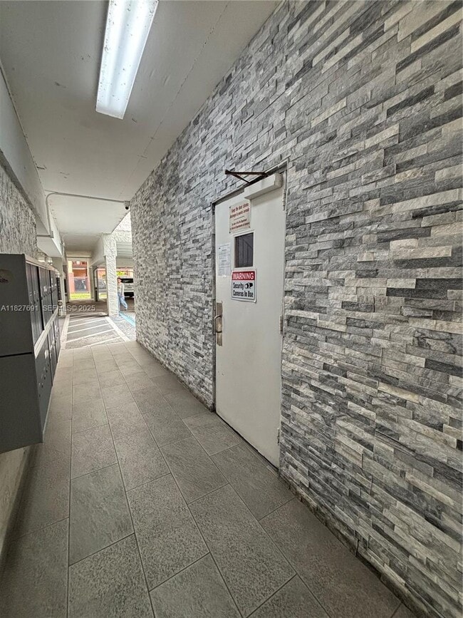 Building Photo - 6125 W 20th Ave Unit 217