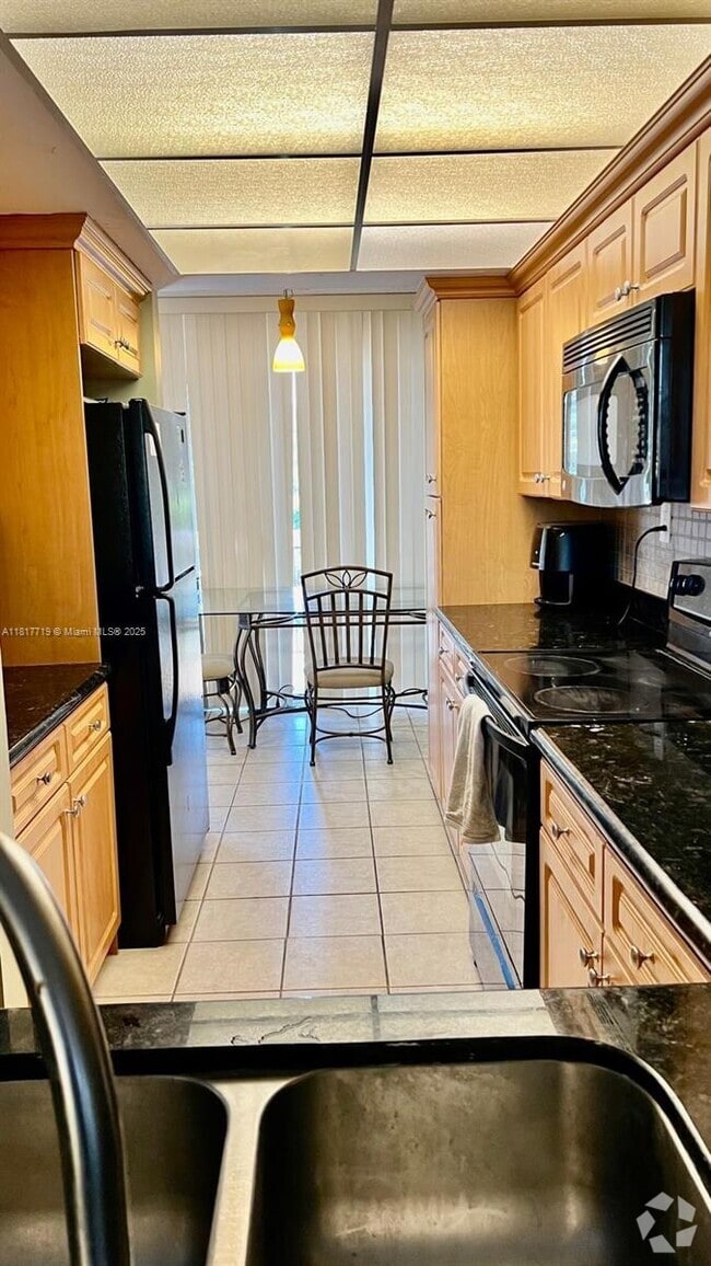Building Photo - 8711 SW 30th St Unit 106 Rental