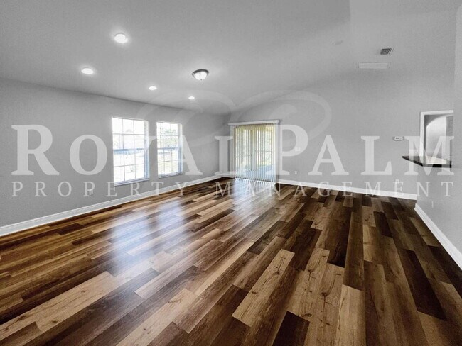 Building Photo - Bloom Into Your New Home – 3BR/2BA Lehigh Acres Rental, Get This... Garage AND Lawn Care Included!