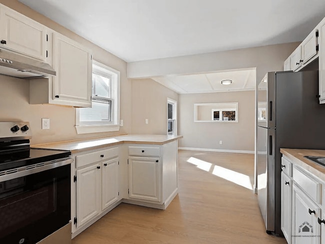 Photo - Spacious 4-Bedroom Home with Garage & Modern Heating for Rent in Waterville