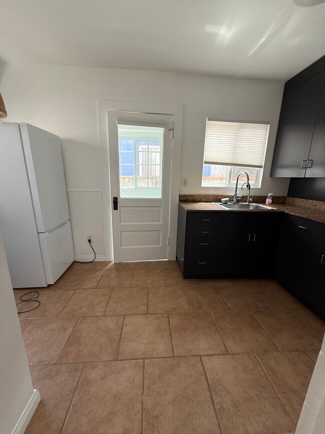 Fridge can move to Water heater / Storage Room - 4241 Lincoln Ave Unit C