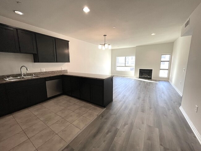 Building Photo - 5827 Carlton Way Unit 203