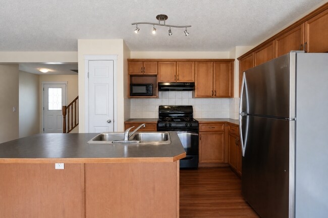Photo - 149 Cougar Plateau Mews SW