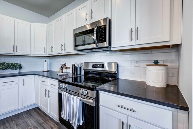 Experience the perfect blend of charm and technology in your cottage’s beautiful kitchen, equipped with smart home features, including convenient USB outlets.