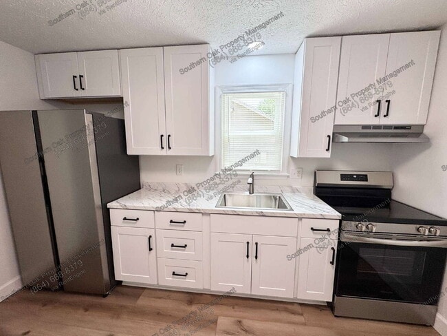 Photo - 104 Caron Ln