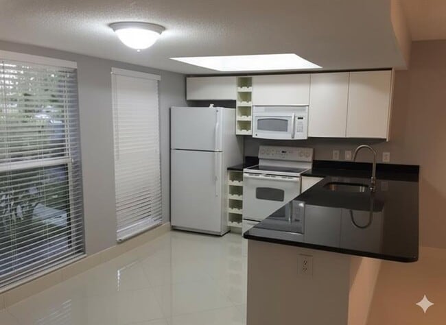 Photo - 704 NE 23rd Ave Unidad 2