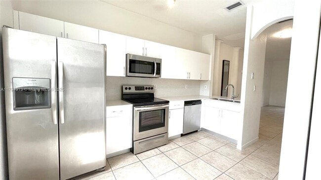 Building Photo - 5600 NW 114th Pl Unit 207 Rental