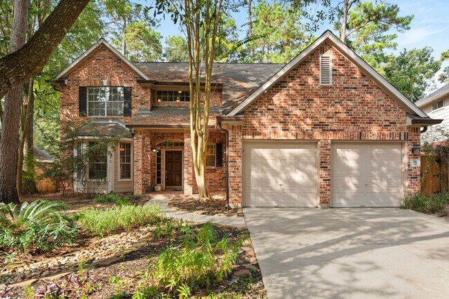 Building Photo - The Perfect Woodlands Retreat: Steps from ...