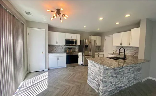 Photo - 482 E 77th Ave