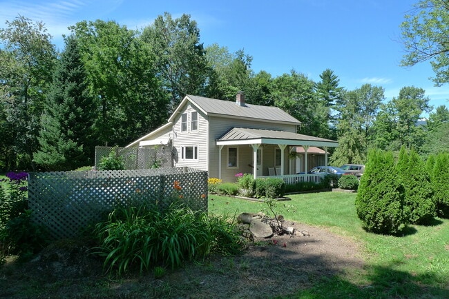 Photo - Charming Two-Bedroom Home in a Peaceful Wo...