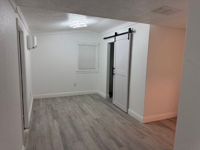 Photo - Charming 4-Bed Home with Bonus Room in Tampa! Landscaping/Utilities Included. Available Now!!