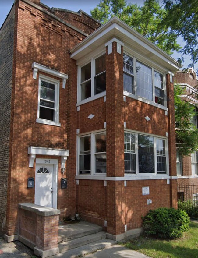 Building Photo - 1543 N Lorel Ave Unit 2