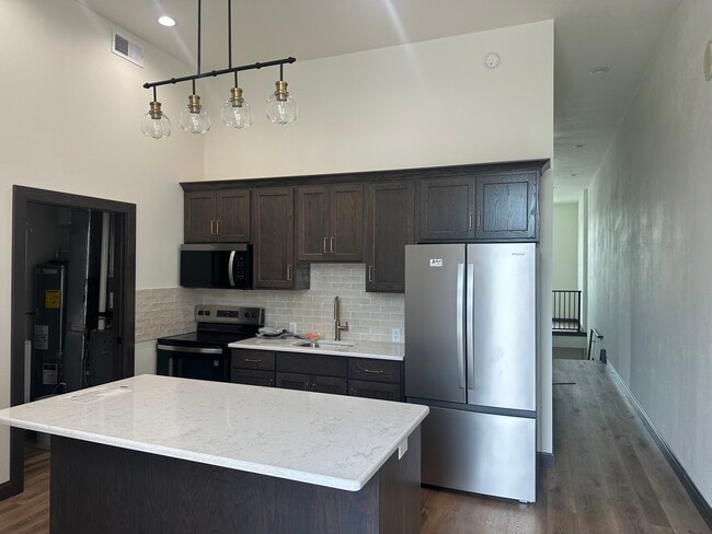 Kitchen with new appliances - 210 S Main St Unit 210 S Main St