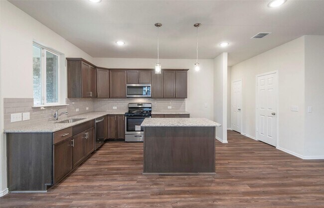 Photo - Move-In Ready 4-Bedroom Home with Ideal Lo...