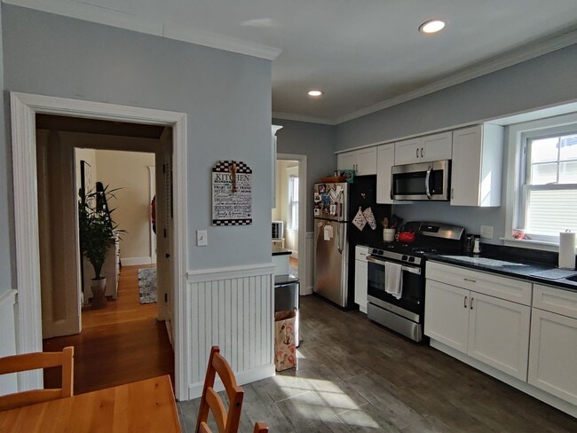 Photo - Large Fully Renovated Unit in Oak Sq. Free Laundry, Backyard, Patio, Parking Included