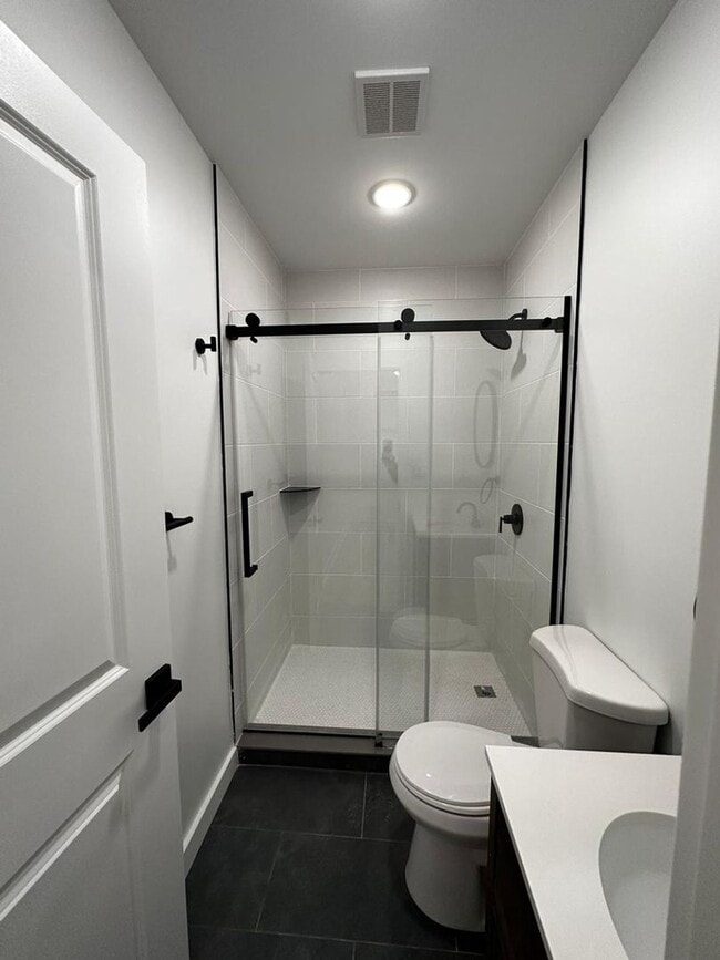 Photo - Renovated 2BR/2BA w/ Private Yard, Porch & In-Unit Laundry Unit 1F