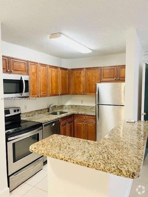 Building Photo - 10765 Cleary Blvd Unit 103 Rental