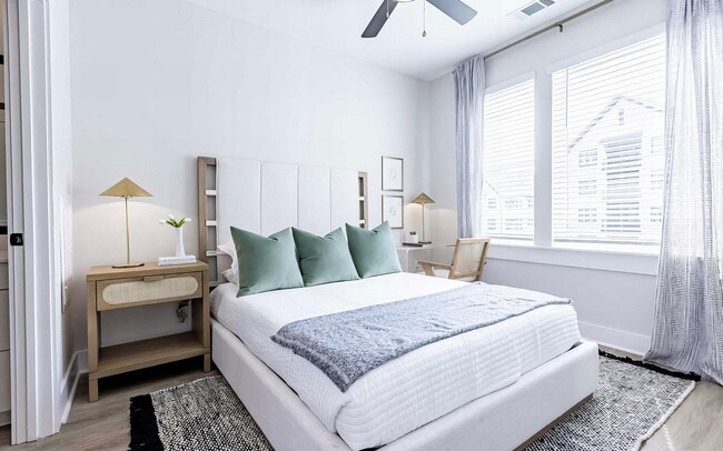 Daylight on one wall, and floor space left for more than just the bed.