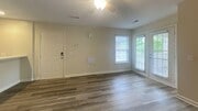 3Bed Living Room View with the New LVT Flooring, and Keyless Smart Locks.