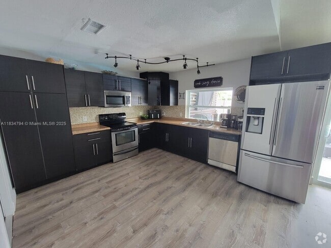 Building Photo - 12041 NW 34th Pl Rental