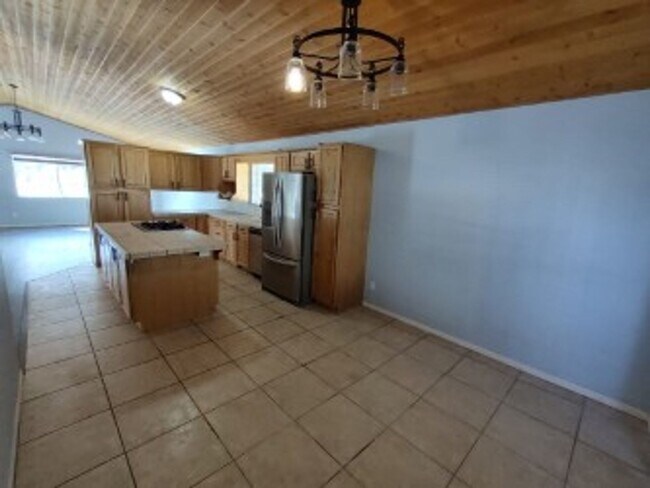 Photo - Move-In Ready 3-Bedroom Cabin-Style Home with Huge Yard, Deck & Garage in Pine Mountain Club