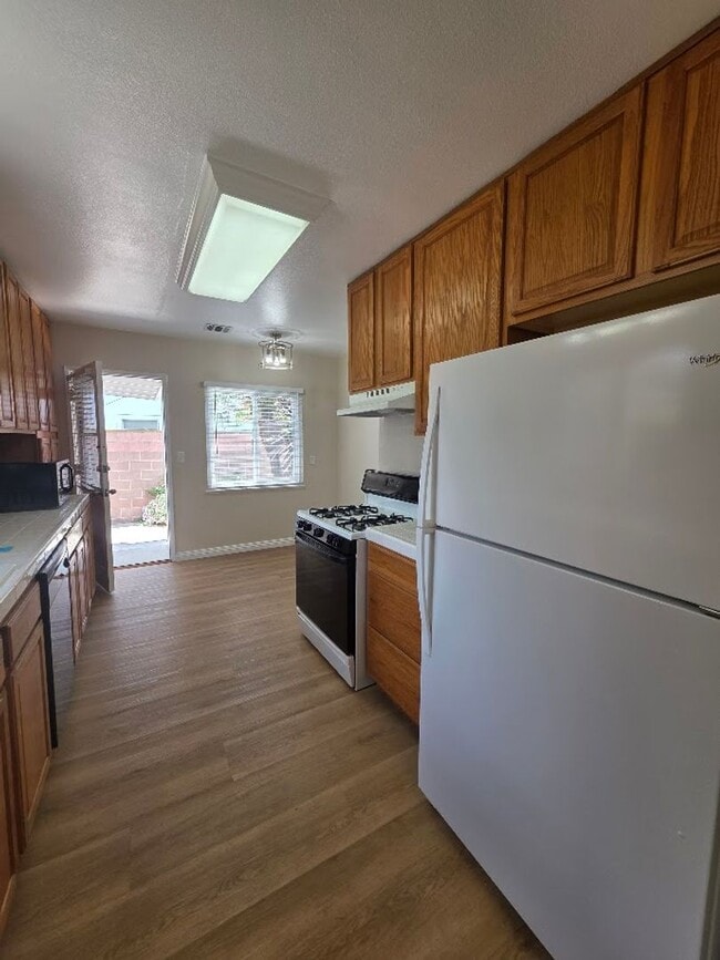 Photo - TURNKEY-RENT READY SPACIOUS 2BD/2BA HOME, 2-CAR GARAGE WITH AN AUTOMATIC ROLL-UP DOOR, LARGE COVE...