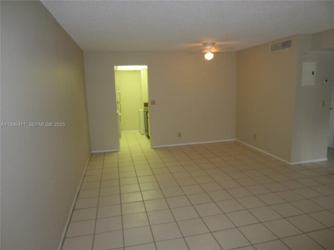 Building Photo - 10812 Royal Palm Blvd Unit 10812