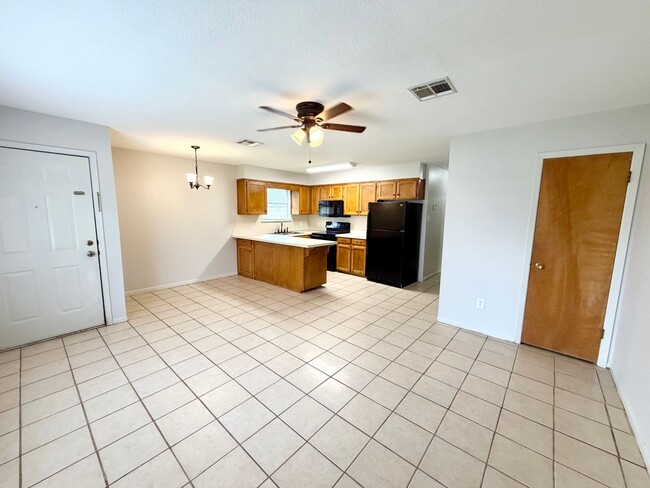 Photo - Move-In Ready 2BR Duplex | Private Yard | Great Location | Pets Welcome