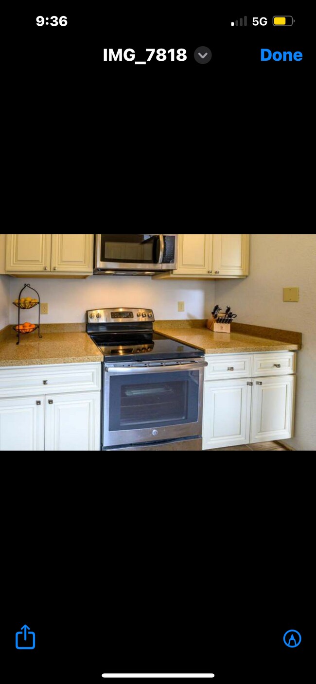 Electric stove/oven and microwave - with plenty of kitchen cabinets - 1 Appian Way Condo Unit 710-6